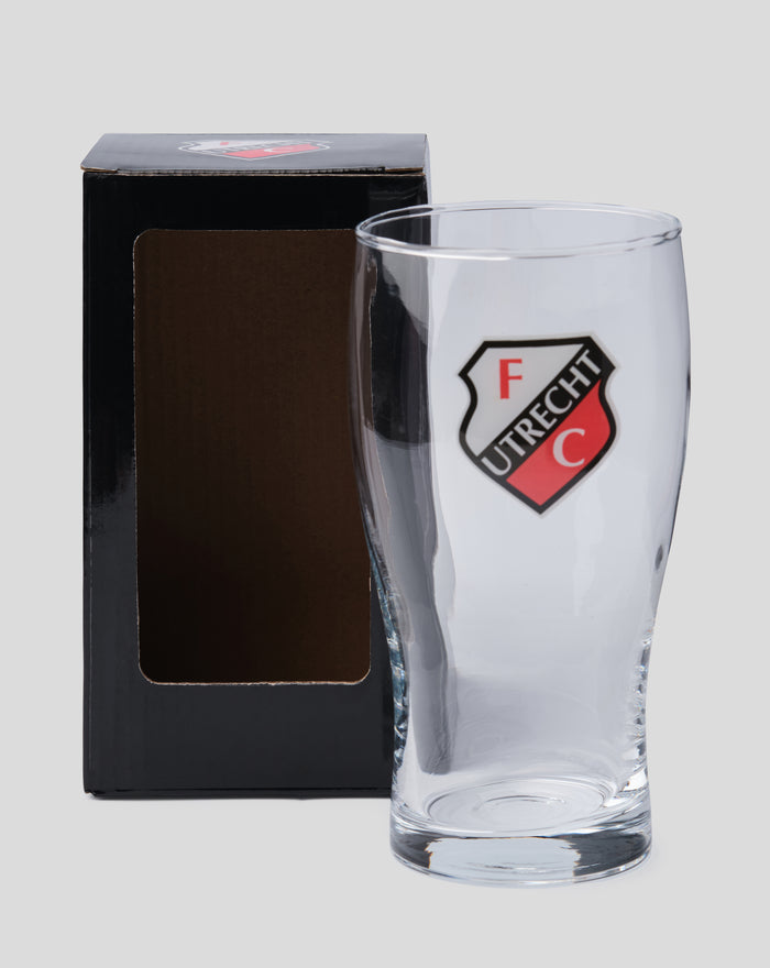 FC Utrecht Pint beer glass beside its black box with the club crest on the glass.
