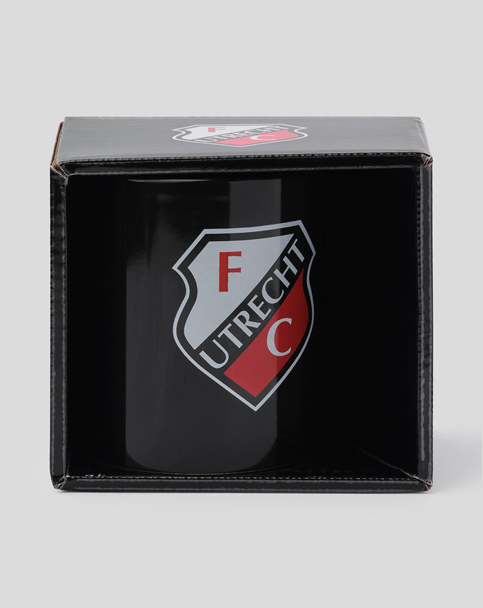Mug with the FC Utrecht crest inside an open black box shown at an angle.