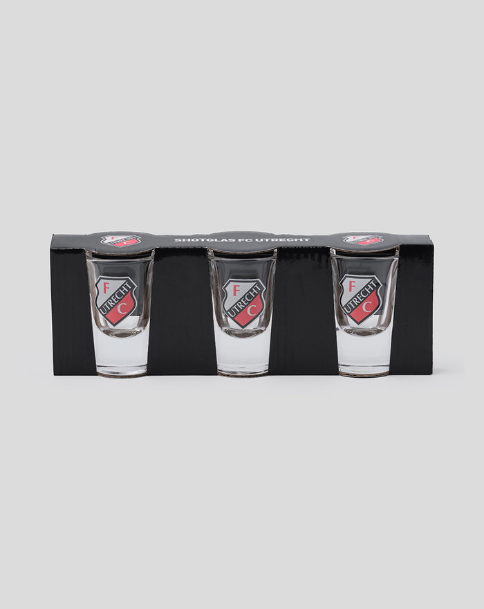 Set of three FC Utrecht shot glasses in a black holder, each with the club crest.