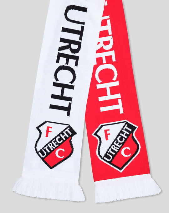 Close up of FC Utrecht scarf with UTRECHT text and crest on red and white panels