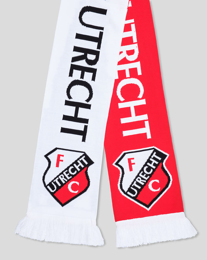 Close up of FC Utrecht scarf with UTRECHT text and crest on red and white panels